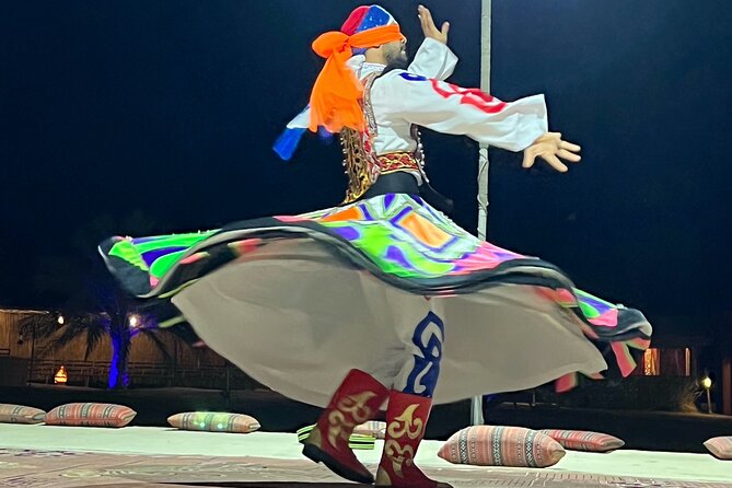 Desert Safari Abu Dhabi w/ Sand Boarding, Camel Ride & BBQ Dinner - Belly dancing and tanoura after dark