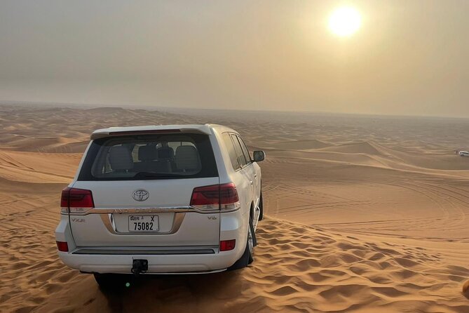Desert safari adventure with BBQ dinner - Camel riding and sandboarding in one 45-minute stop