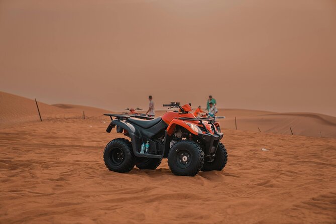 Desert Safari Adventures: Dune Bashing, Camel Rides, and BBQ, ATV - BBQ dinner under the evening sky