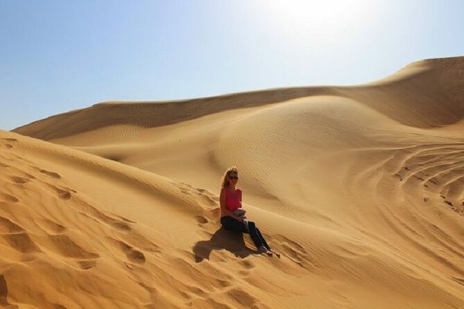 Desert Safari and Quad Bike Experience in Dubai with Dinner - The desert camp after sunset