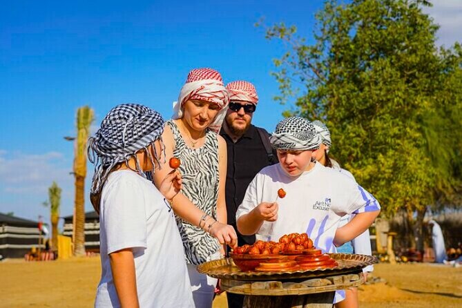 Desert Safari Dubai 30 Mins Quad Bike, Sand Board, Camel Ride BBQ - Barbecue dinner and four evening shows