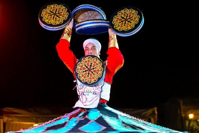 Desert Safari Dubai Adventure With BBQ & Live Shows - Camel riding and sandboarding at the desert stop