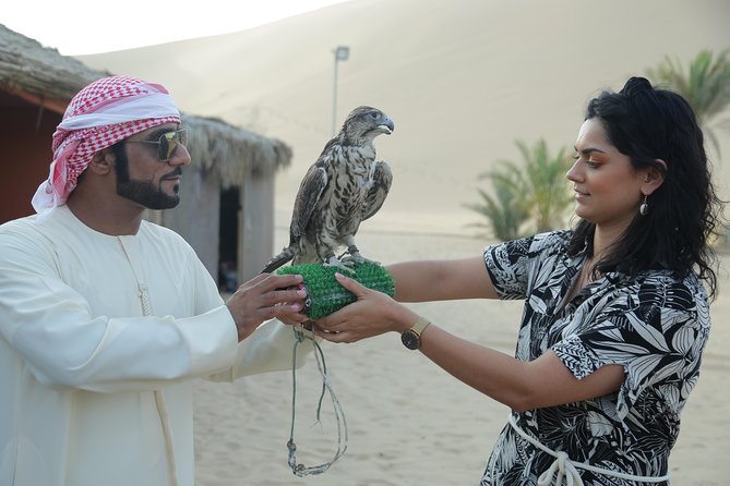 Desert Safari Dubai Sand Bashing, Camel Ride, Shows, Live BBQ - Camp activities: sandboarding, henna, tea, and Arabic dress