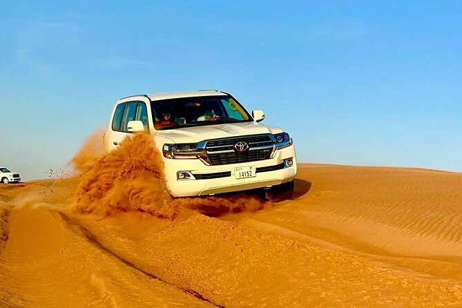 Desert Safari Dubai with BBQ Dinner & Camel Ride - Dune bashing in a 4x4 SUV