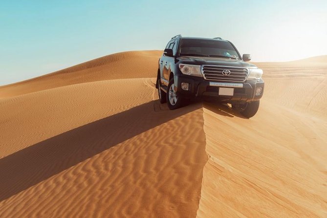 Desert Safari Dubai with Dune Bashing, Sandboarding, Camel Ride, 5 Shows, Dinner - BBQ dinner and the evening shows