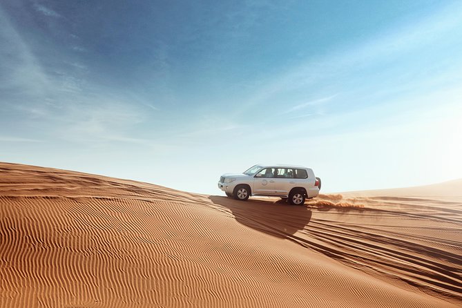Desert Safari Dubai with Dune Bashing, Sandboarding, Camel Ride, 5 Shows, Dinner - What the guide can change