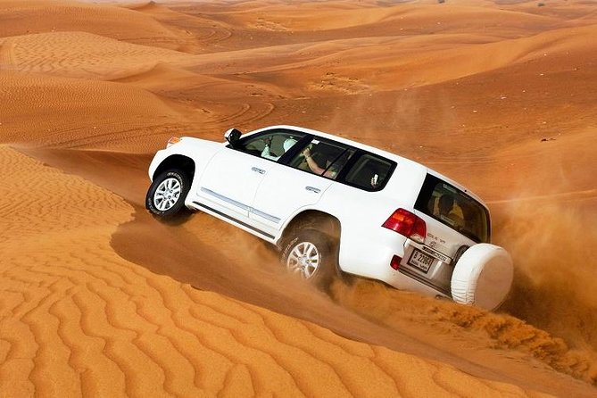 Desert Safari Dubai With Quad Bike ,camel Ride, bbq Dinner, Live Show's - Dune bashing across Dubai’s red sand