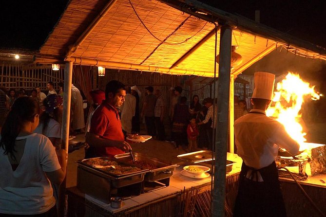 Desert Safari in 4X4 through Lahbab Desert with BBQ Dinner - BBQ dinner with music, dancing, and fire shows