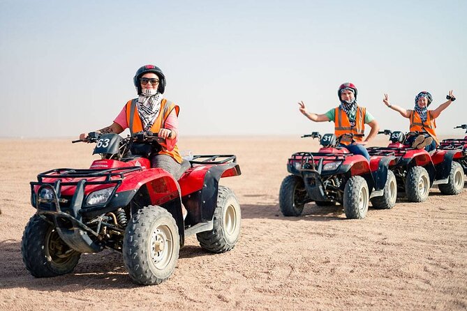 Desert Safari, Quad Biking, Sand Surfing and BBQ Dinner In Dubai - Dune bashing across the red sand
