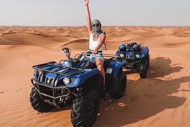 Desert Safari with 30 Minutes Quad Biking on High Red Dunes (Complete Package) - Hotel pickup in a shared luxury 4x4