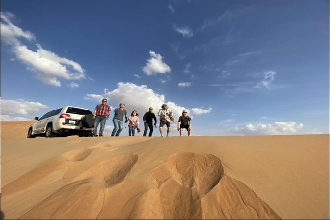 Desert Safari With Bab Al Shams Dinner - Sunset from a high dune