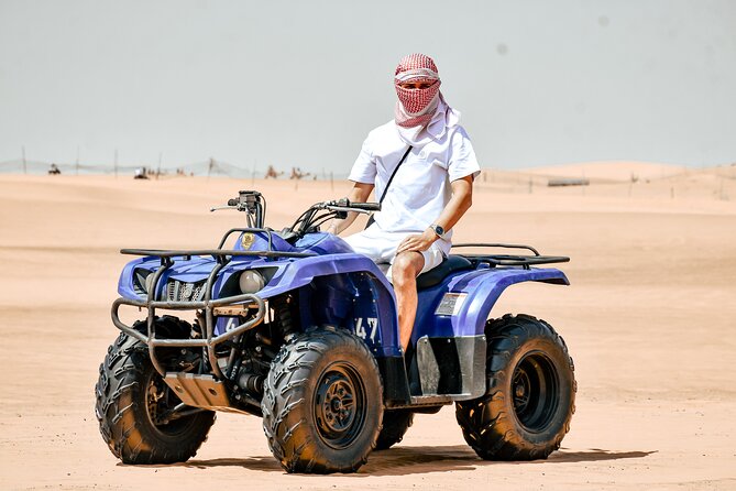 Desert Safari With BBQ Dinner, Quad Bike & Camel Ride from Dubai - Sunset photos, sandboarding, and the open dunes