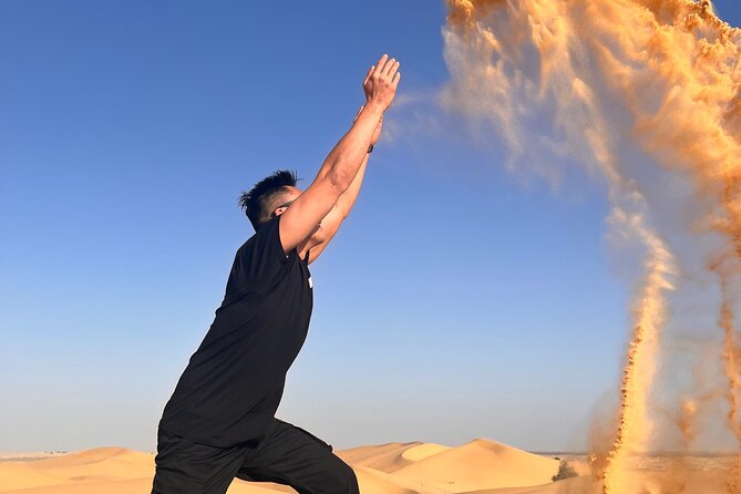 Desert Safari with Dune Bashing and Camel Ride plus Sand Boarding - Camel riding, sand boarding, henna, and falcon photographs