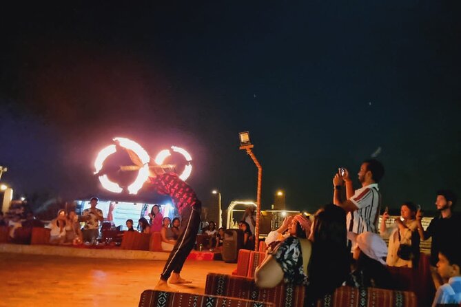 Desert Safari with Dune Bashing and Dinner In Dubai - Camel riding gives the evening a traditional touch