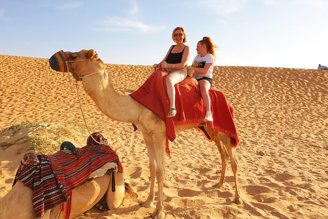Desert Safari with Quad Bike, 4x4 Dune Bashing and Camel Ride - Leaving Dubai for the red dunes of Lahbab