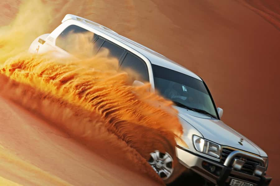 Dubai 4WD Evening Desert Safari - Camel farm, photo stops, and sunset over the sand