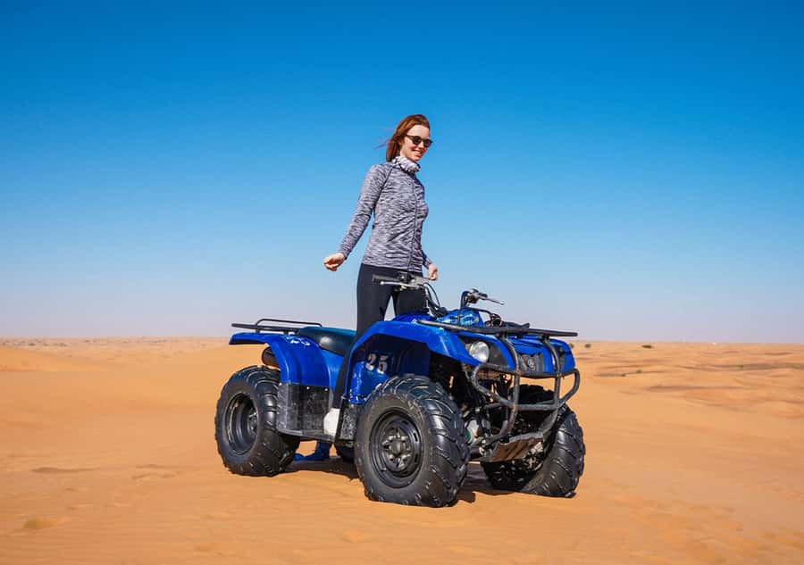 Dubai: Adventure Quad Bike Safari, Camel Ride & Refreshment - Sandboarding after the engine noise