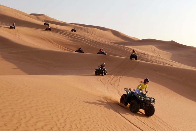 Dubai: Adventure Quad Bike Safari, Camel Ride & Refreshments - Sandboarding on the red dunes