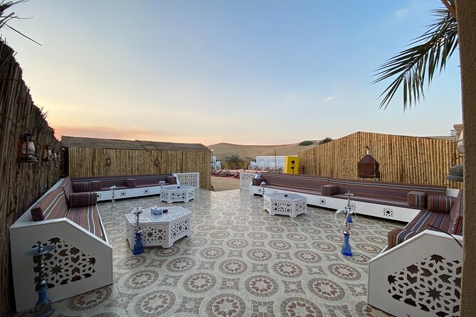 Dubai Afternoon Desert Safari and BBQ Dinner - Camel riding and sandboarding at the camp