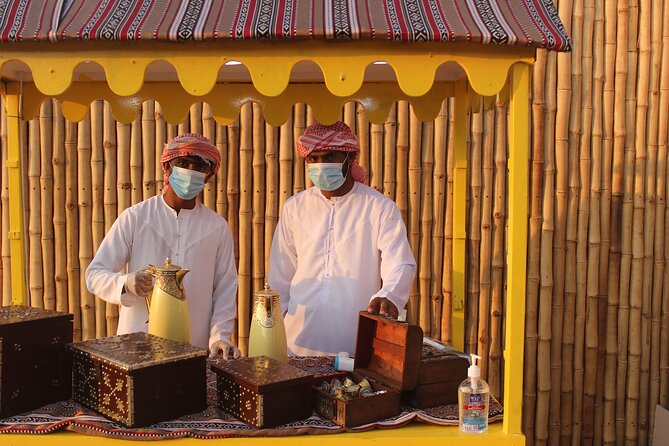 Dubai Afternoon Desert Safari and BBQ Dinner - Henna, shisha, and a taste of local customs