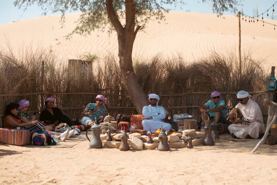 Dubai: Al Marmoom Oasis Camp Experience with Bedouin Dinner - Falcon photos and traditional clothes at the village