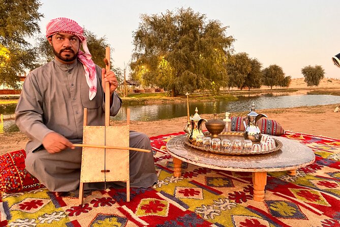 Dubai: Al Marmoom Oasis Vintage Safari: Camels, Stargazing & Meal - Sunset, falcons, henna, and Arabian dress
