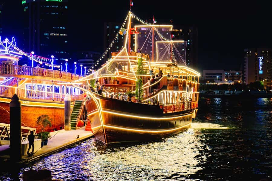 Dubai: Al Seef Largest Dhow Dinner Cruise with Live Show - Boarding the dhow and choosing your place