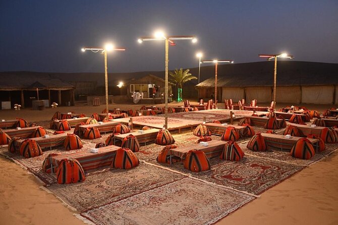 Dubai: Buggy Dune Bashing, Sand Boarding, Camel Ride & Show - Dinner and stage entertainment at the desert camp