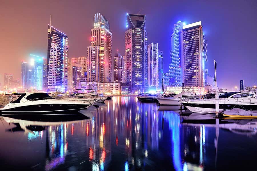 Dubai by Night City Tour with Fountain Show - Dubai Marina puts the focus on yachts and night lights
