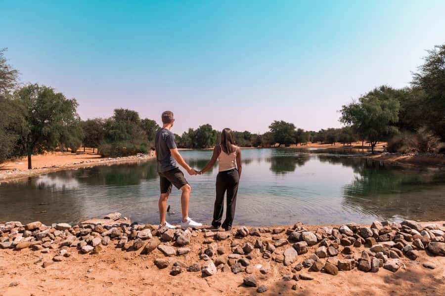 Dubai: Camel Safari, Wildlife & Lakeside Breakfast - Riding a dromedary across the sand