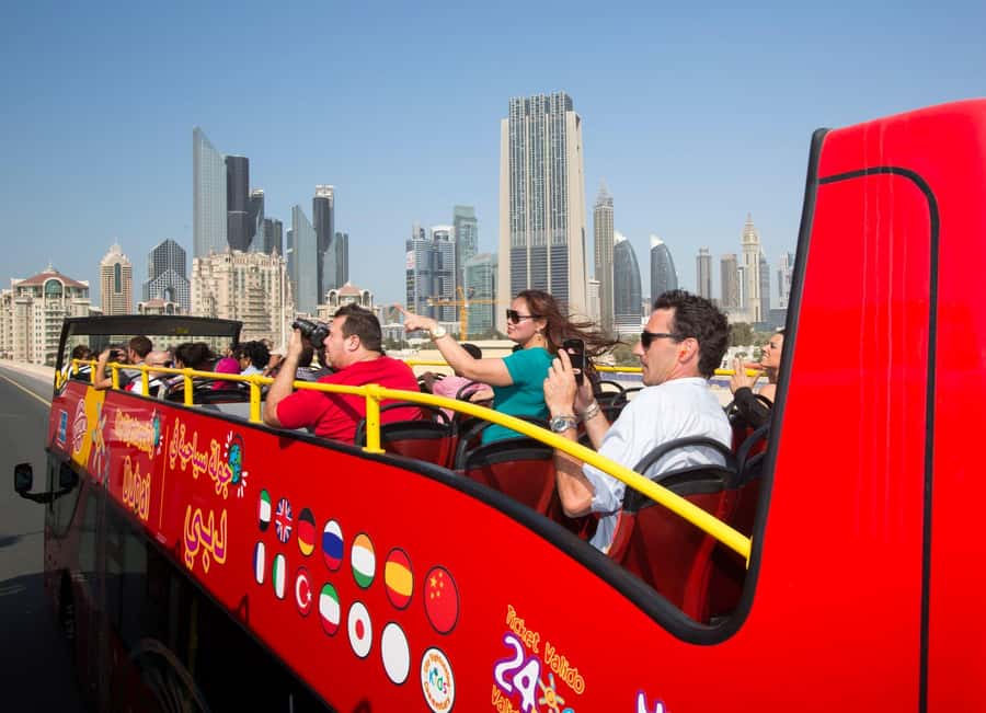 Dubai: City Sightseeing HOHO Bus Tour + Sunset & Night Tour - Audio commentary, seating, and onboard comfort