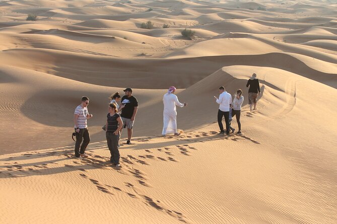 Dubai Desert Bespoke: Red Dunes Safari, Camel Ride & BBQ Options - The high dune, sunset, and sandboarding