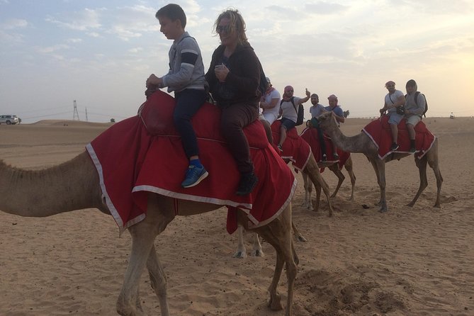 Dubai: Desert Camel Ride with Live Shows & BBQ Buffet Dinner - Coffee, dates, and camp traditions