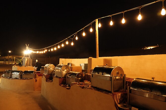 Dubai Desert Camp Dinner with BBQ, Dinner, Camel Ride & Shows - A BBQ banquet with plenty on the table