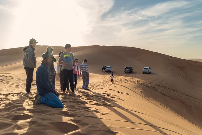 Dubai Desert Discovery: Red Dunes Safari, Sandboard & Camel Ride - Shared or private transport, and the group feel