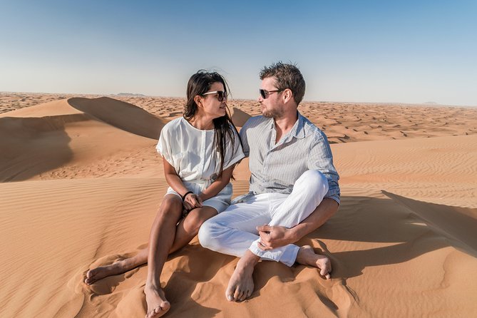 Dubai Desert Discovery: Red Dunes Safari, Sandboard & Camel Ride - Lahbab’s red dunes and the first camel stop