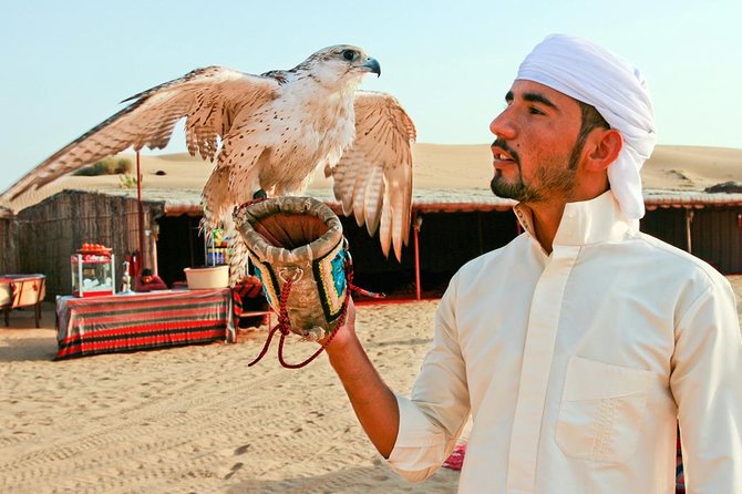 Dubai Desert Journey: Red Dunes Safari with BBQ in Bedouin Camp - Sunset over Lahbab’s red sand