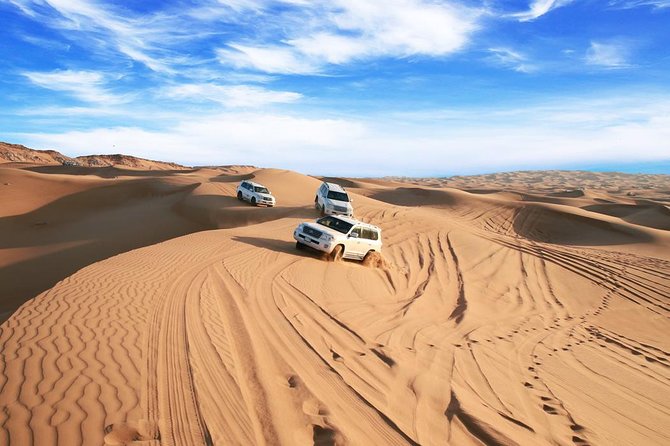 Dubai Desert Journey: Red Dunes Safari with BBQ in Bedouin Camp - Bedouin-style camp activities
