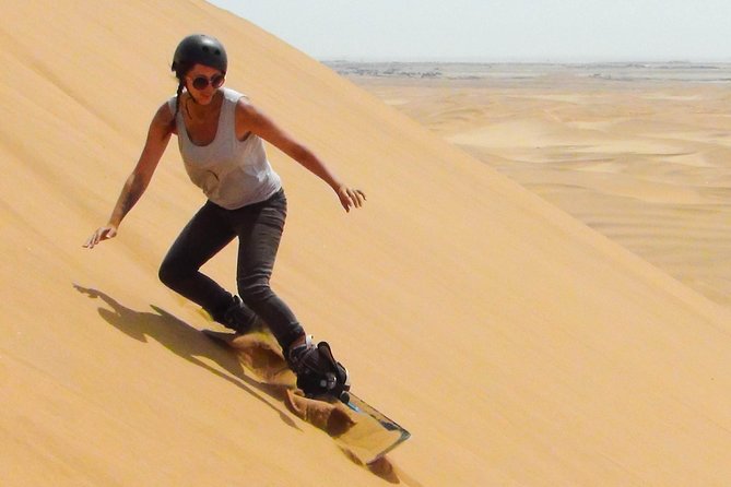 Dubai Desert Red Dune Half-Day Safari Adventure and BBQ Dinner - Sandboarding and the Short Camel Ride