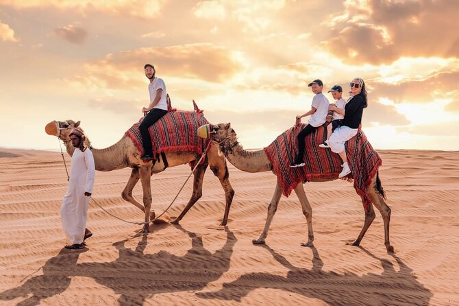 Dubai Desert Safari, BBQ, Live Shows, Camel, Sandboard (7-Hours) - Sandboarding and sunset photos at the high dunes
