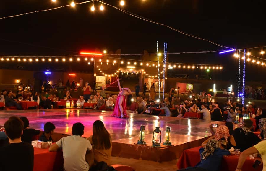 Dubai: Desert Safari, Camel Ride, and BBQ Dinner - Camel ride, henna, and desert customs