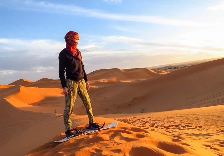 Dubai: Desert Safari, Camel Ride, Sandboard & Buffet Dinner - Dune bashing is the high point