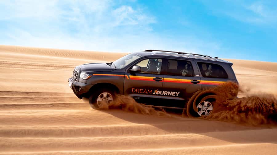 Dubai Desert Safari - Camel Ride, Sandboarding & 30 Min Quad - Leaving Dubai for the red dunes