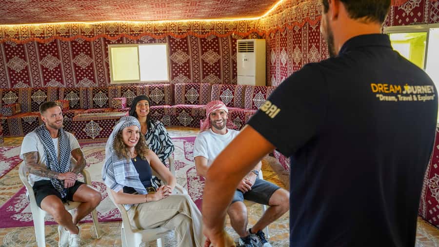 Dubai Desert Safari - Camel Ride, Sandboarding & 30 Min Quad - Sandboarding from the highest dune
