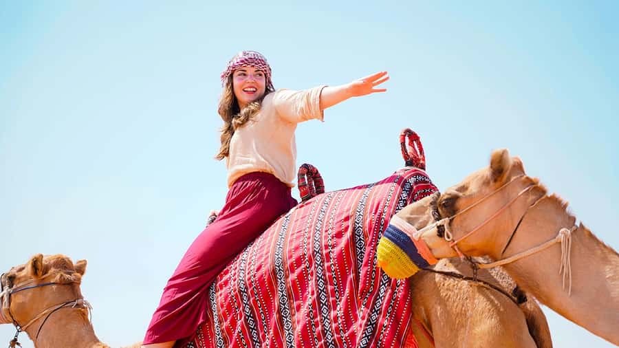 Dubai: Desert Safari, Camel Ride, Sandboarding, Quad Bike - From Dubai streets to the Red Dunes