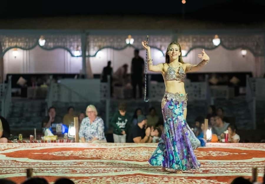Dubai: Desert Safari Camel Riding, Sandboarding & BBQ Dinner - BBQ dinner and live entertainment