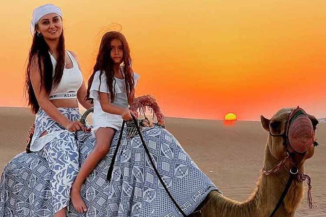 Dubai Desert Safari: Dune Drive Camel & 5<em> BBQ Shows Stargazing – Key points at a glance’ /></p>
<ul>
<li><strong>Red dunes near Lahbab:</strong> The 4WD ride includes a fast 15-minute run across the desert, followed by a photo stop.</li>
<li><strong>Several activities in one evening:</strong> You can combine dune bashing, sandboarding, a camel ride, henna, costumes, dinner, and live shows.</li>
<li><strong>Shared pickup for up to six:</strong> Hotel or home pickup is included, but private transport costs extra.</li>
<li><strong>Optional motorized thrills:</strong> Quad bikes and dune buggies are available at the desert stop for an additional charge and at least 30 minutes.</li>
<li><strong>Evening camp program:</strong> Expect a BBQ buffet, vegetarian choices, belly dancing, Tanoura, fire entertainment, and open-sky stargazing.</li>
<li><strong>A few comfort tradeoffs:</strong> The basic seating may not be beside the stage, and the camp can feel busy despite the small vehicle group.</li>
</ul>
<h2>From Dubai streets to Lahbab’s red dunes</h2>
<p><img width="669" height="446" decoding="async" src=