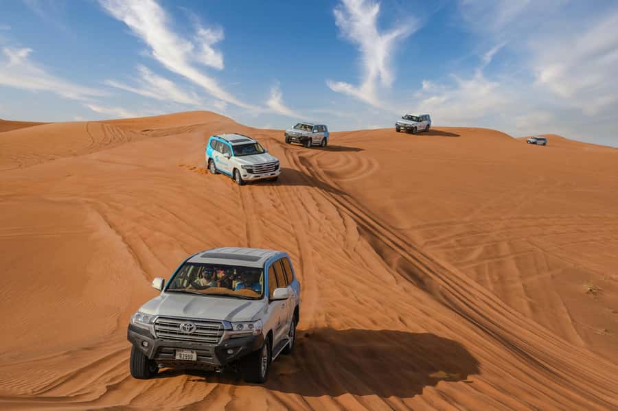 Dubai: Desert Safari, Quad Bike, Camel Ride & Al Khayma Camp - Al Khayma Camp, dinner, and evening shows