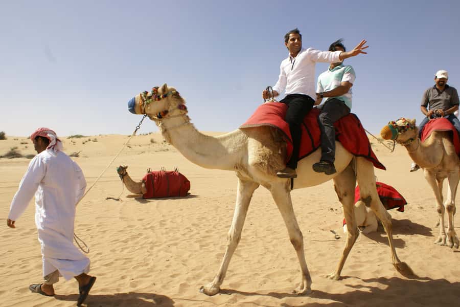 Dubai: Desert Safari, Quad Bike, Camel Ride and Sandboarding - Sandboarding and the high-dune photo stop