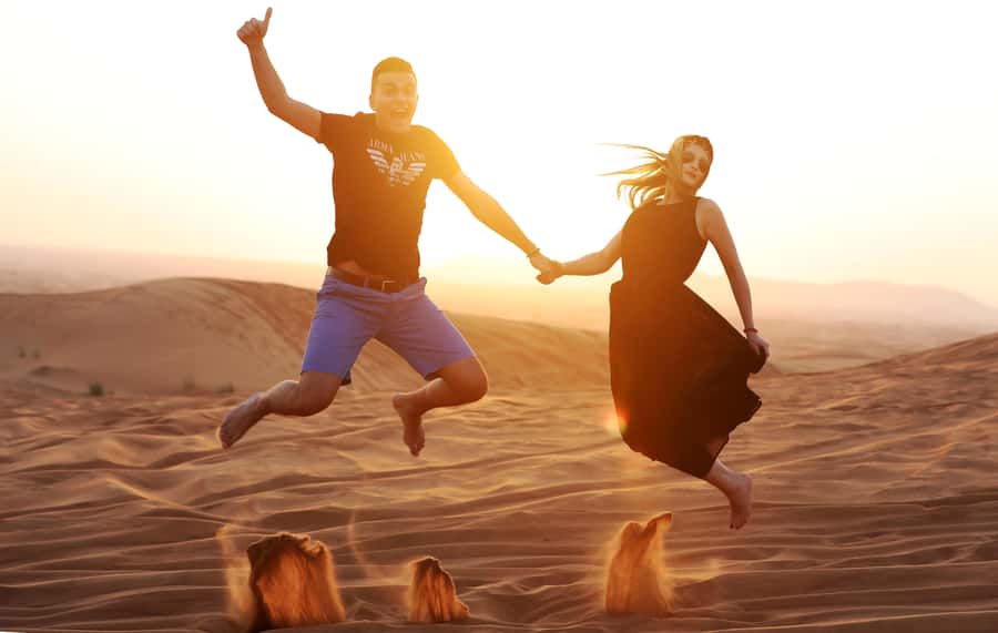 Dubai: Desert Safari, Quad Bike, Sandboarding, Camels & BBQ - Fire and dance shows close the evening